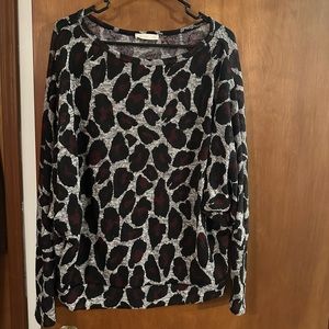 Light weight off shoulder sweater. Animal print size medium